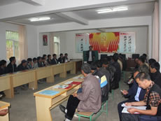 Clean energy advocates of Fuyuan County in Yunnan conducting community educational activities on clean energy at the office of the village committee, with the support from PCD.