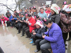 Miao women hold a contest on embroidery as an activity for cultural and historical heritage. 