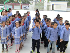 Children from a primary school also have their uniformed made from traditional cloth in traditional ethnic style.
